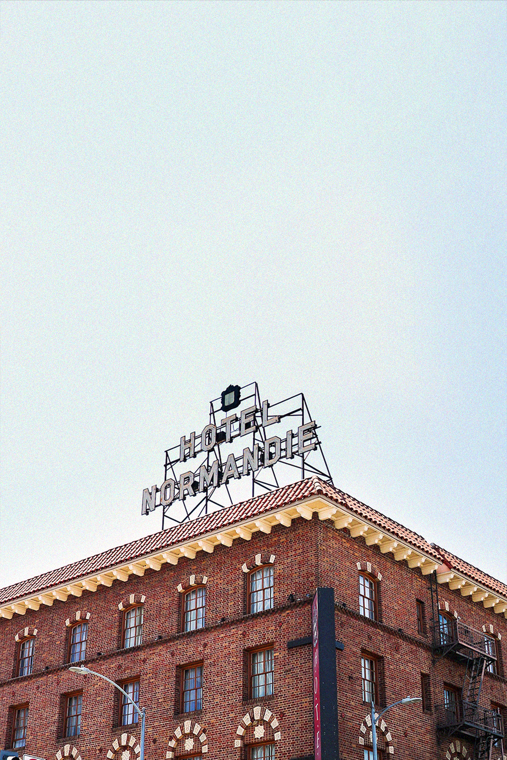 Photo of Hotel Normandie sign on roof